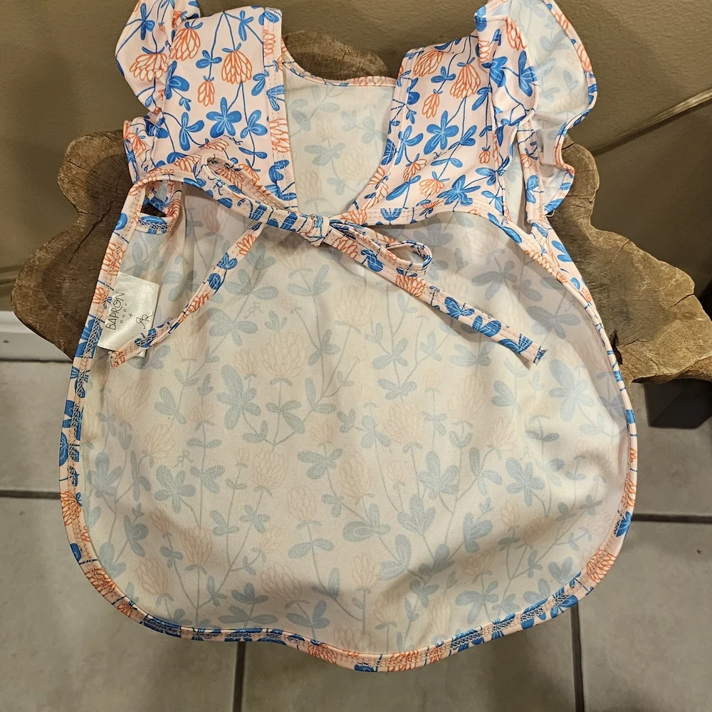 Bapron-Bib & Apron Hybrid Floral Design With Ruffles